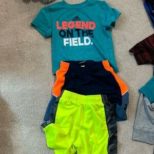 Soccer top and 2 pairs of shorts